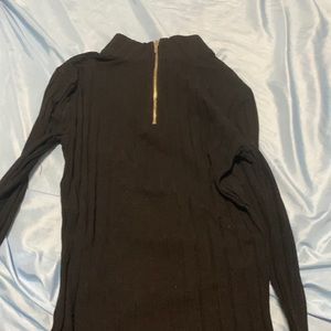 Black top with gold zipper